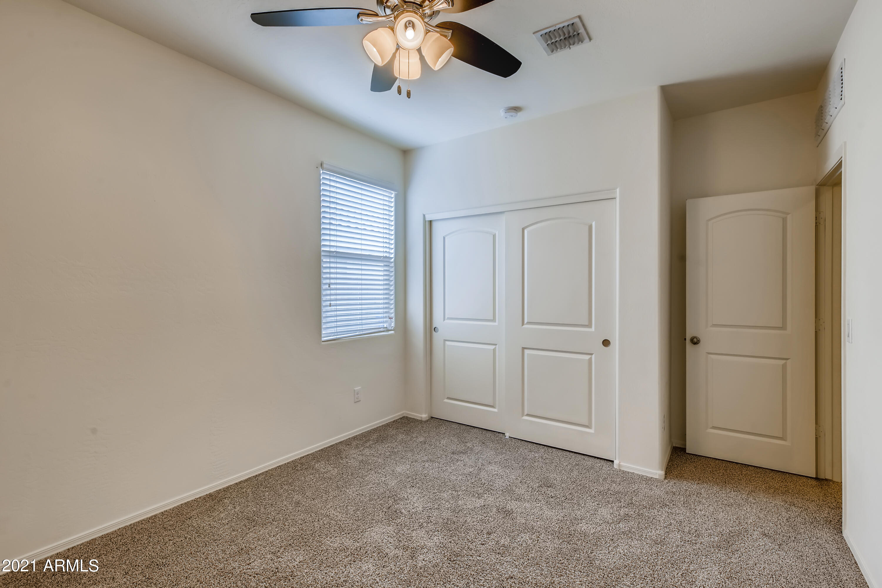 23807 West Chipman Road Buckeye, AZ 85326 - Photo 26 of 33 26-572780569-28 Bedroom