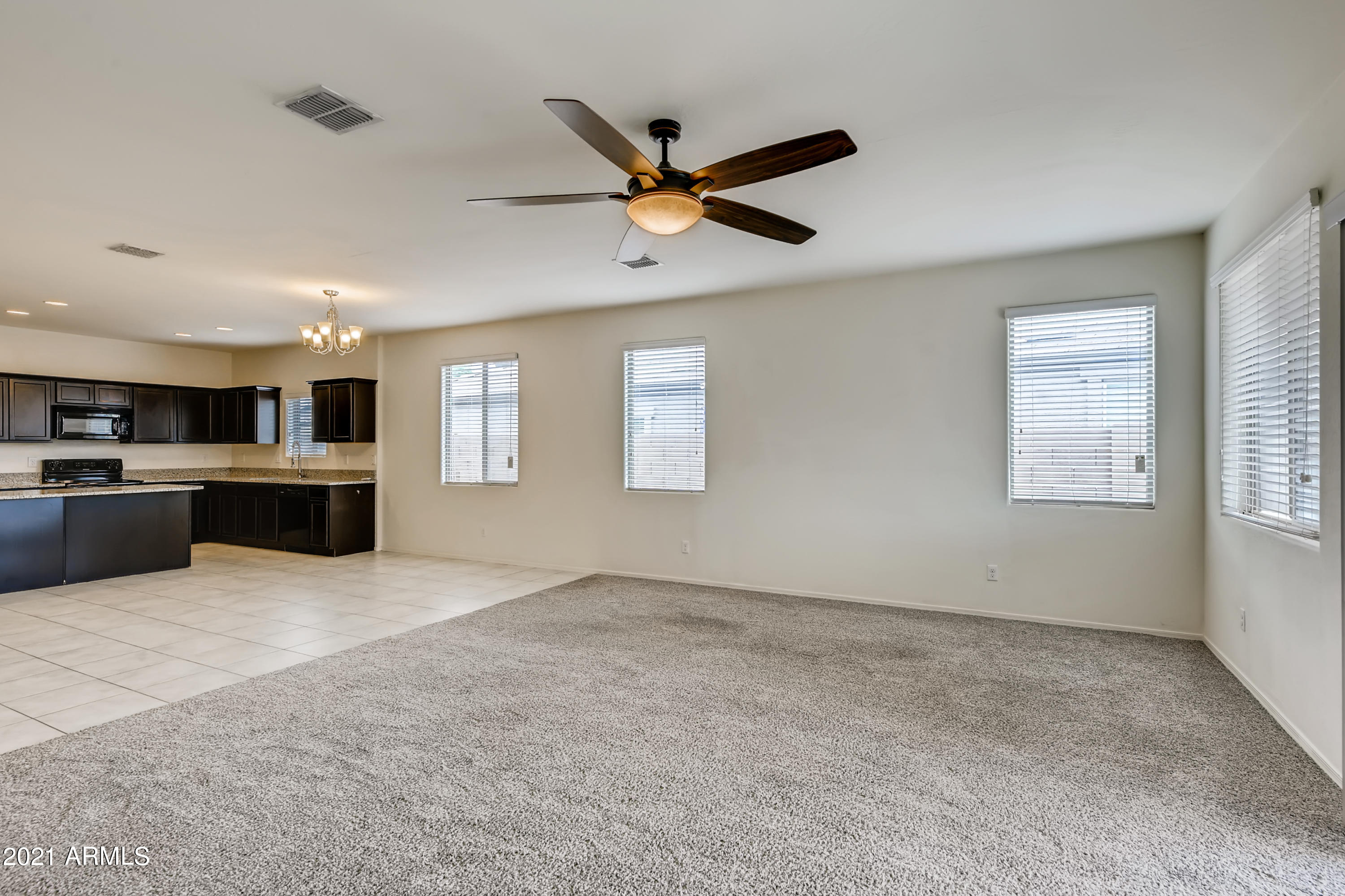 23807 West Chipman Road Buckeye, AZ 85326 - Photo 6 of 33 6-356359694-07 Living Room