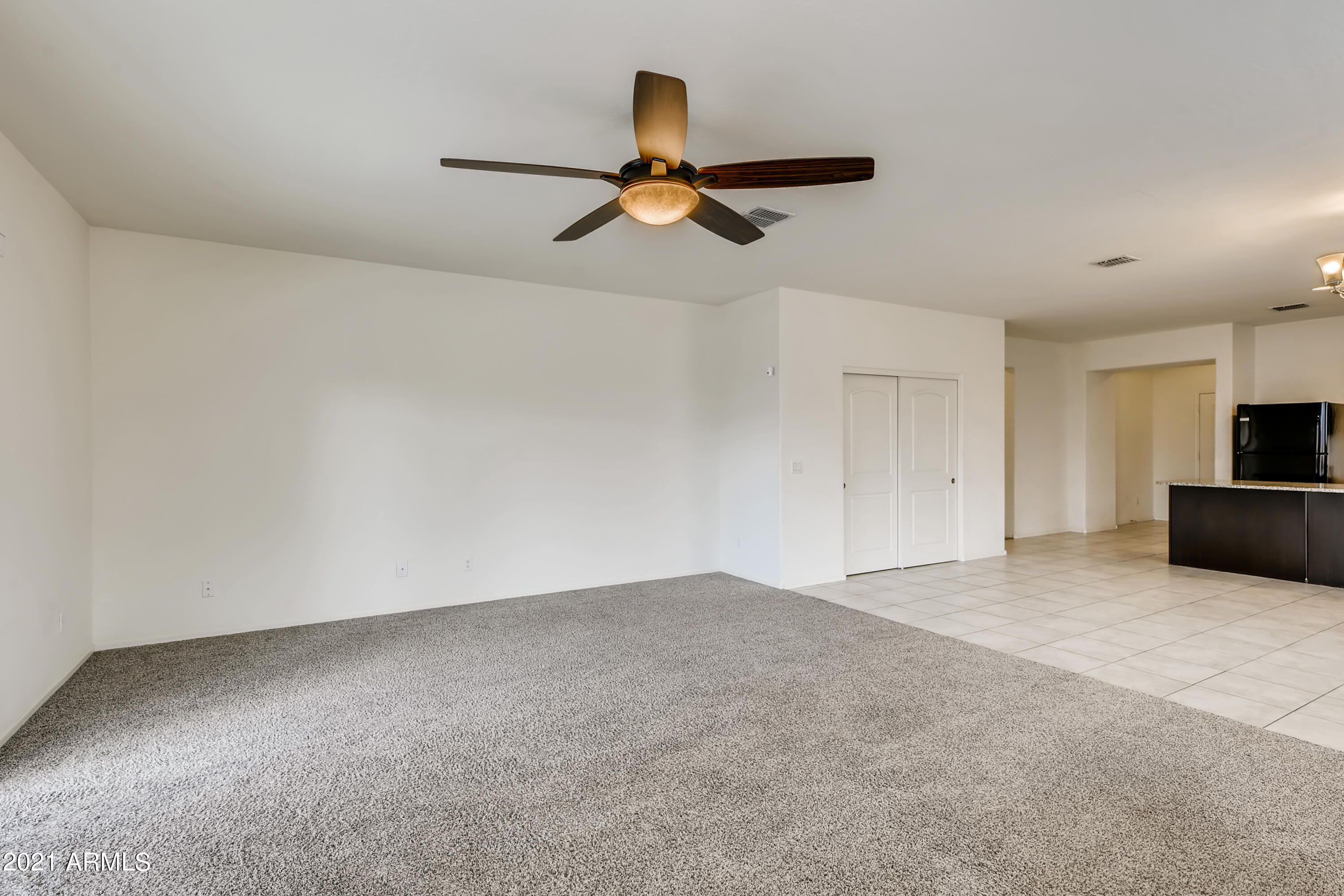 23807 West Chipman Road Buckeye, AZ 85326 - Photo 7 of 33 7-377515712-08 Living Room