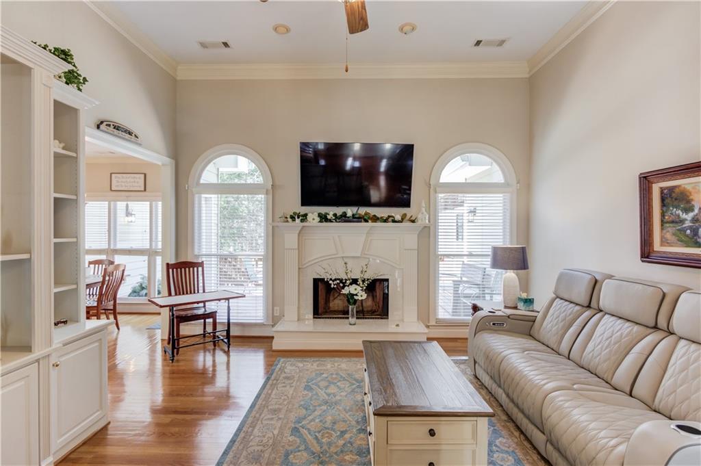 8012 Cypress Point Monroe, GA 30656 - Photo 14 of 67 a living room with furniture fireplace and flat screen tv