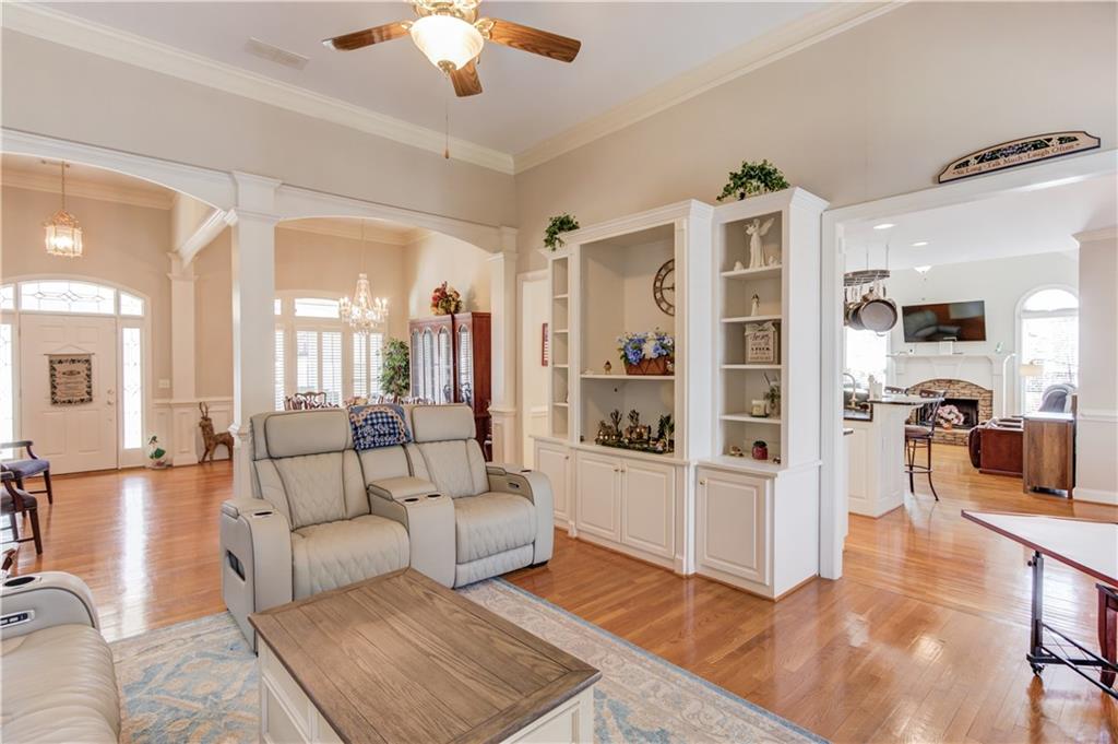 8012 Cypress Point Monroe, GA 30656 - Photo 16 of 67 a living room with furniture and a large window