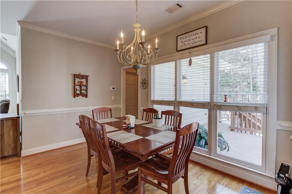 8012 Cypress Point Monroe, GA 30656 - Photo 17 of 67 a view of a dining room with furniture window and outside view