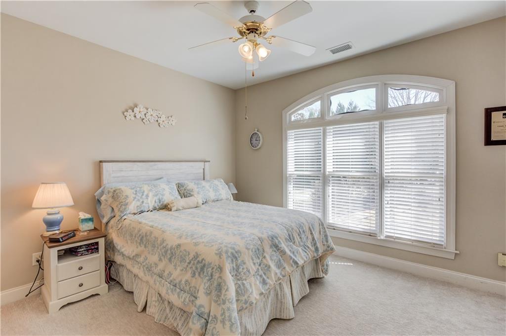 8012 Cypress Point Monroe, GA 30656 - Photo 30 of 67 a bedroom with a bed and a window