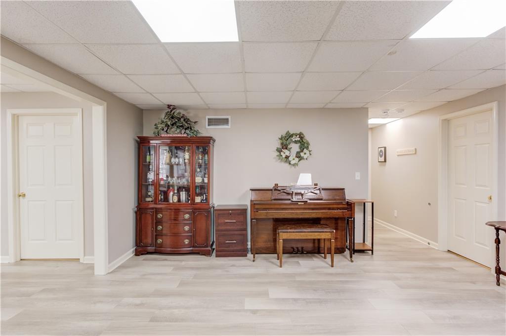 8012 Cypress Point Monroe, GA 30656 - Photo 41 of 67 a view of a livingroom with furniture and staircase