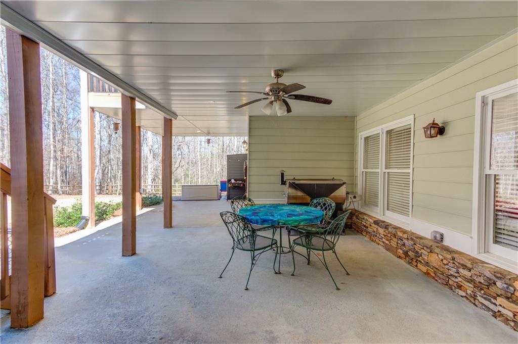 8012 Cypress Point Monroe, GA 30656 - Photo 50 of 67 a view of a livingroom with furniture and a window