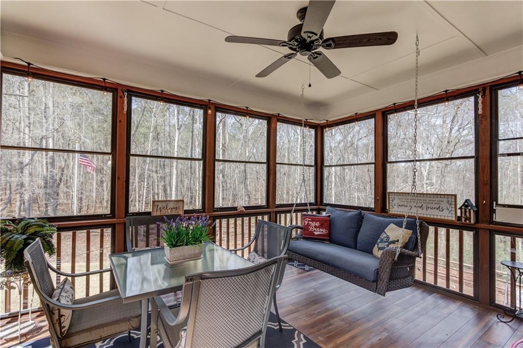 8012 Cypress Point Monroe, GA 30656 - Photo 6 of 67 a living room with furniture and a large window
