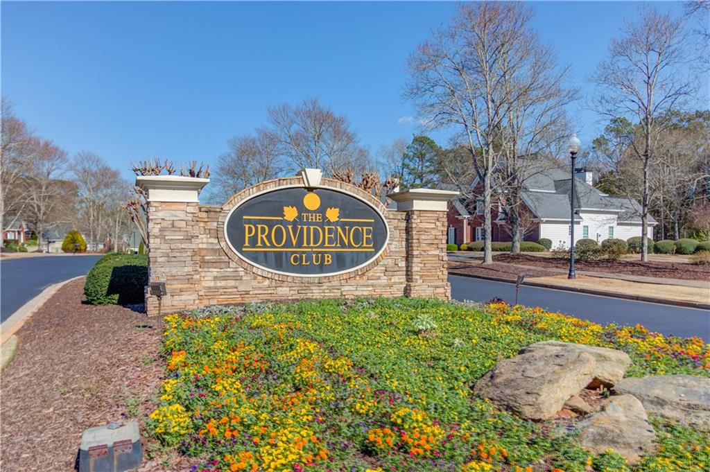 8012 Cypress Point Monroe, GA 30656 - Photo 67 of 67 a sign board with a park on the side of the road