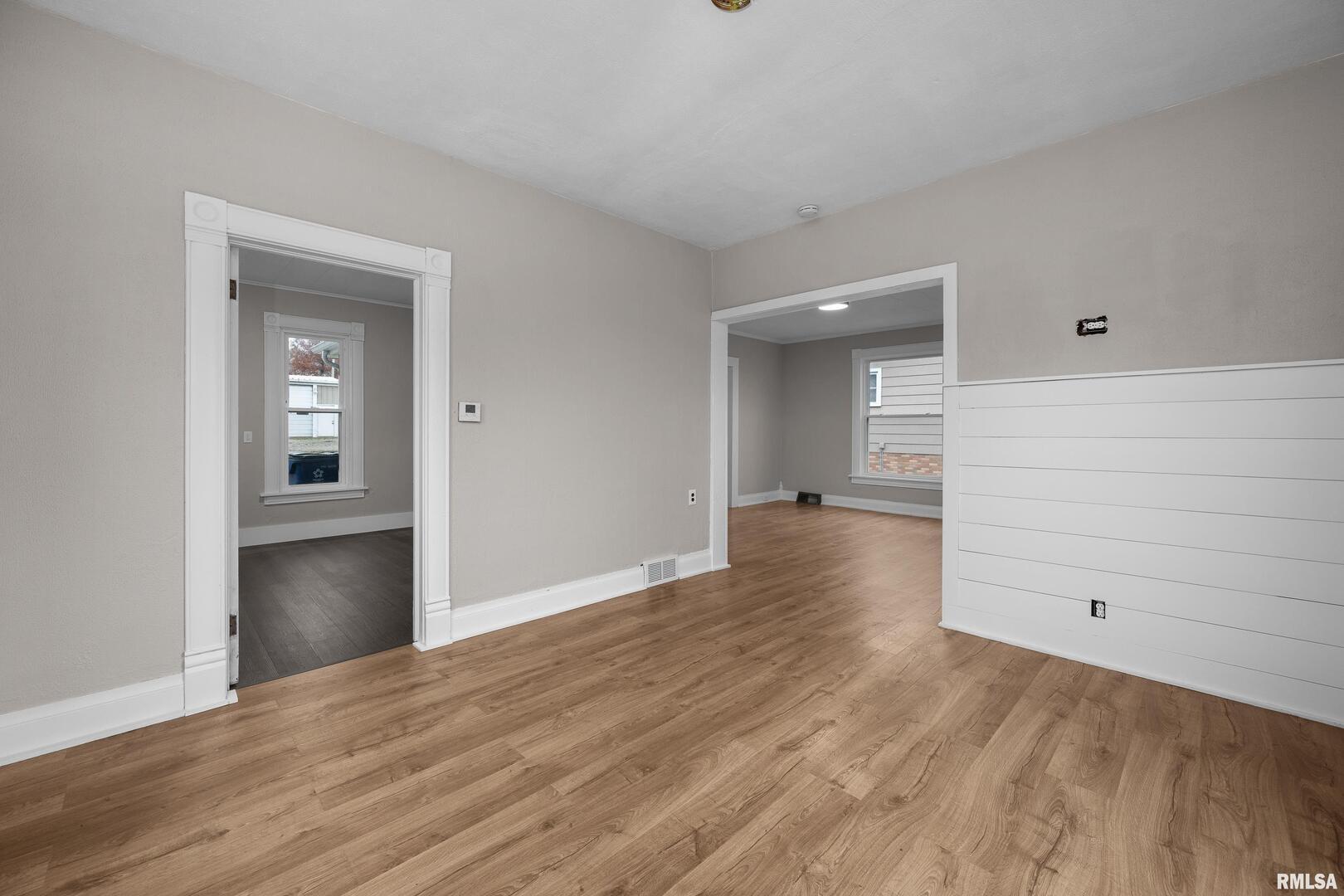 405 North Bluff Street Albany, IL 61230 - Photo 12 of 31 wooden floor in an empty room