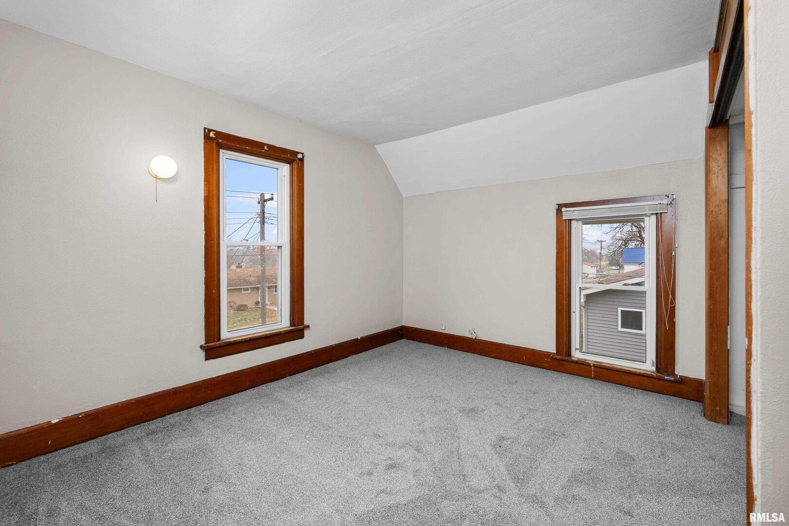 405 North Bluff Street Albany, IL 61230 - Photo 20 of 31 an empty room with windows and closet
