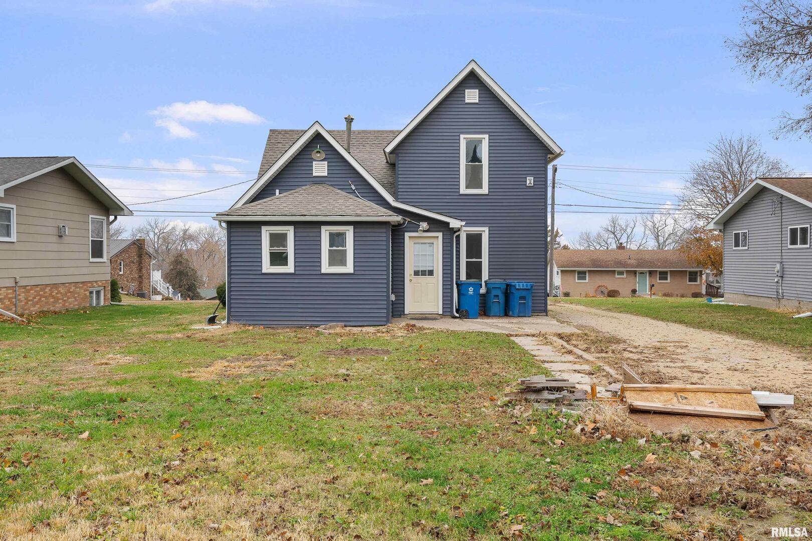 405 North Bluff Street Albany, IL 61230 - Photo 25 of 31 a view of an house with backyard and garden