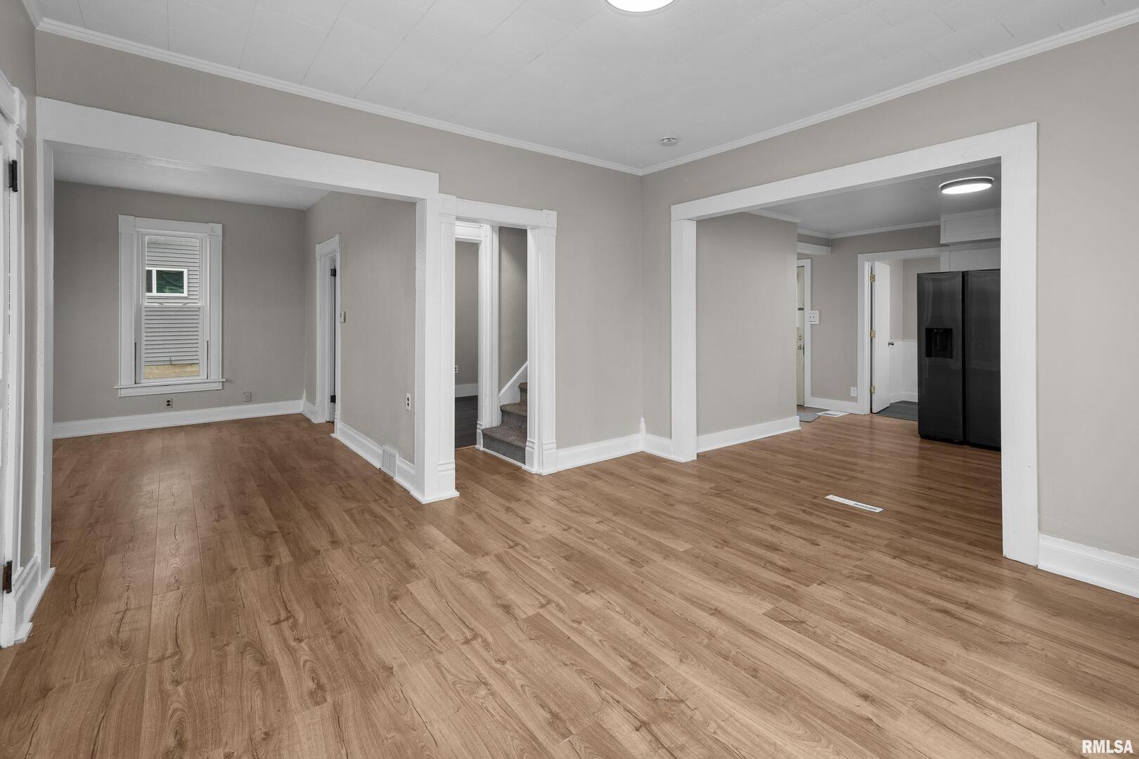 405 North Bluff Street Albany, IL 61230 - Photo 7 of 31 a view of an empty room and wooden floor
