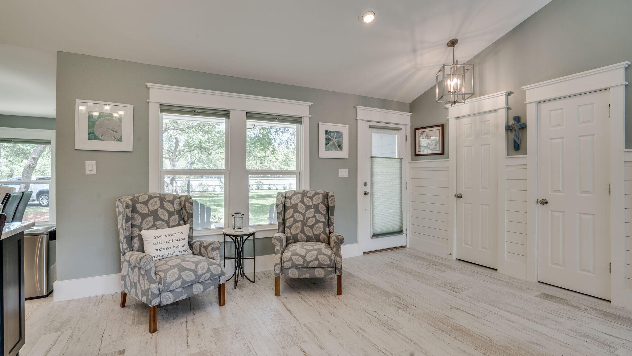 786 Mack Bayou Road Santa Rosa Beach, FL 32459 - Photo 12 of 42 a living room with furniture and wooden floor