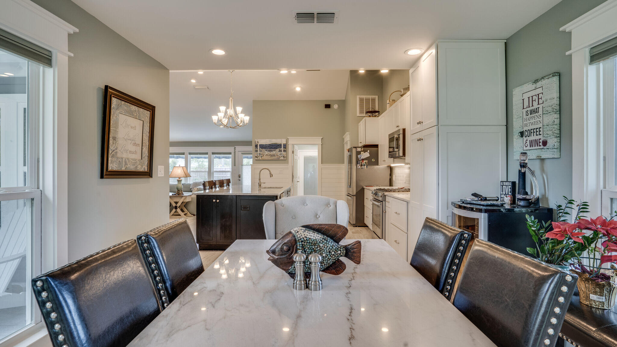 786 Mack Bayou Road Santa Rosa Beach, FL 32459 - Photo 16 of 42 a living room with furniture and wooden floor