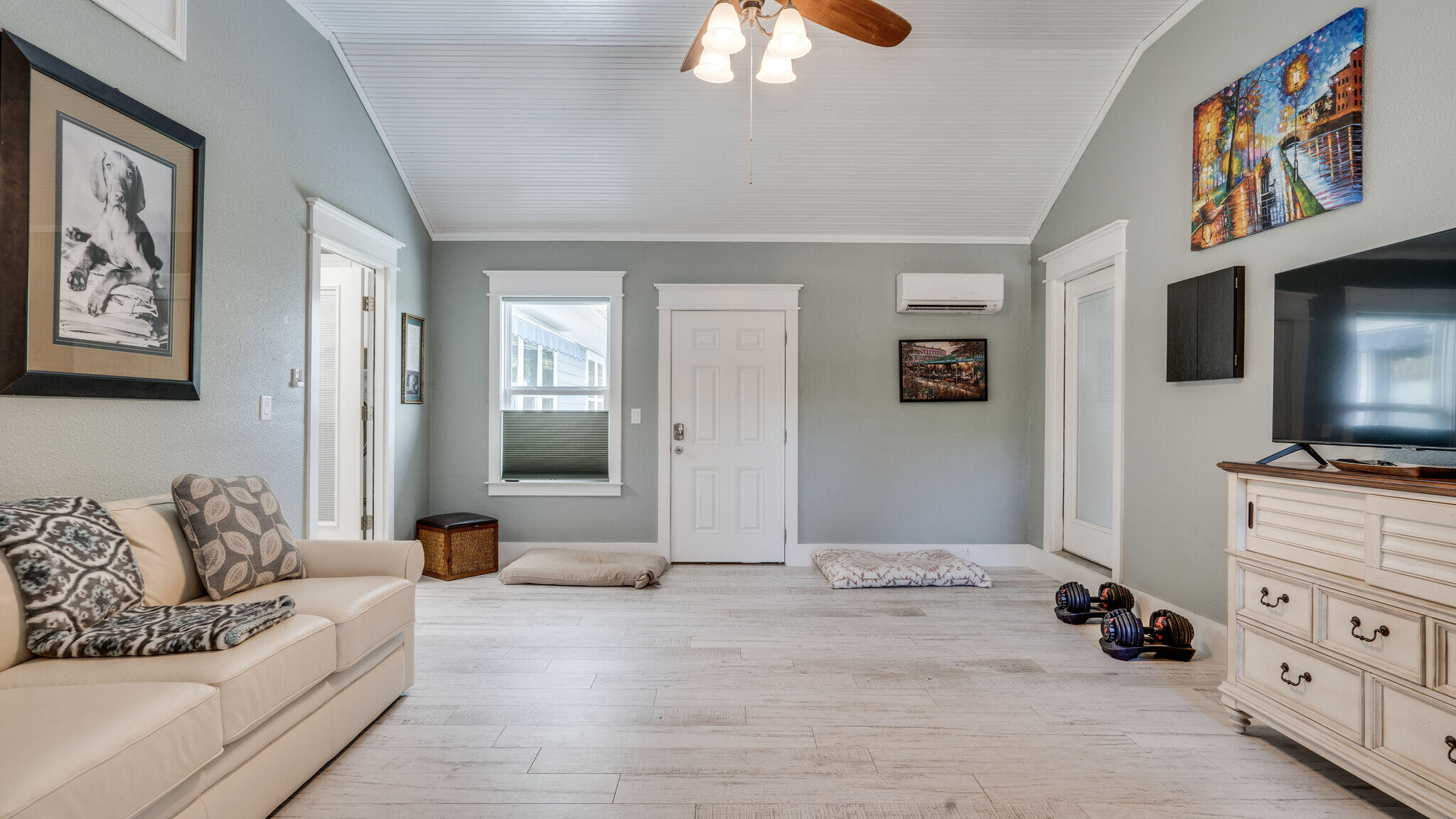 786 Mack Bayou Road Santa Rosa Beach, FL 32459 - Photo 18 of 42 a living room with furniture and a flat screen tv