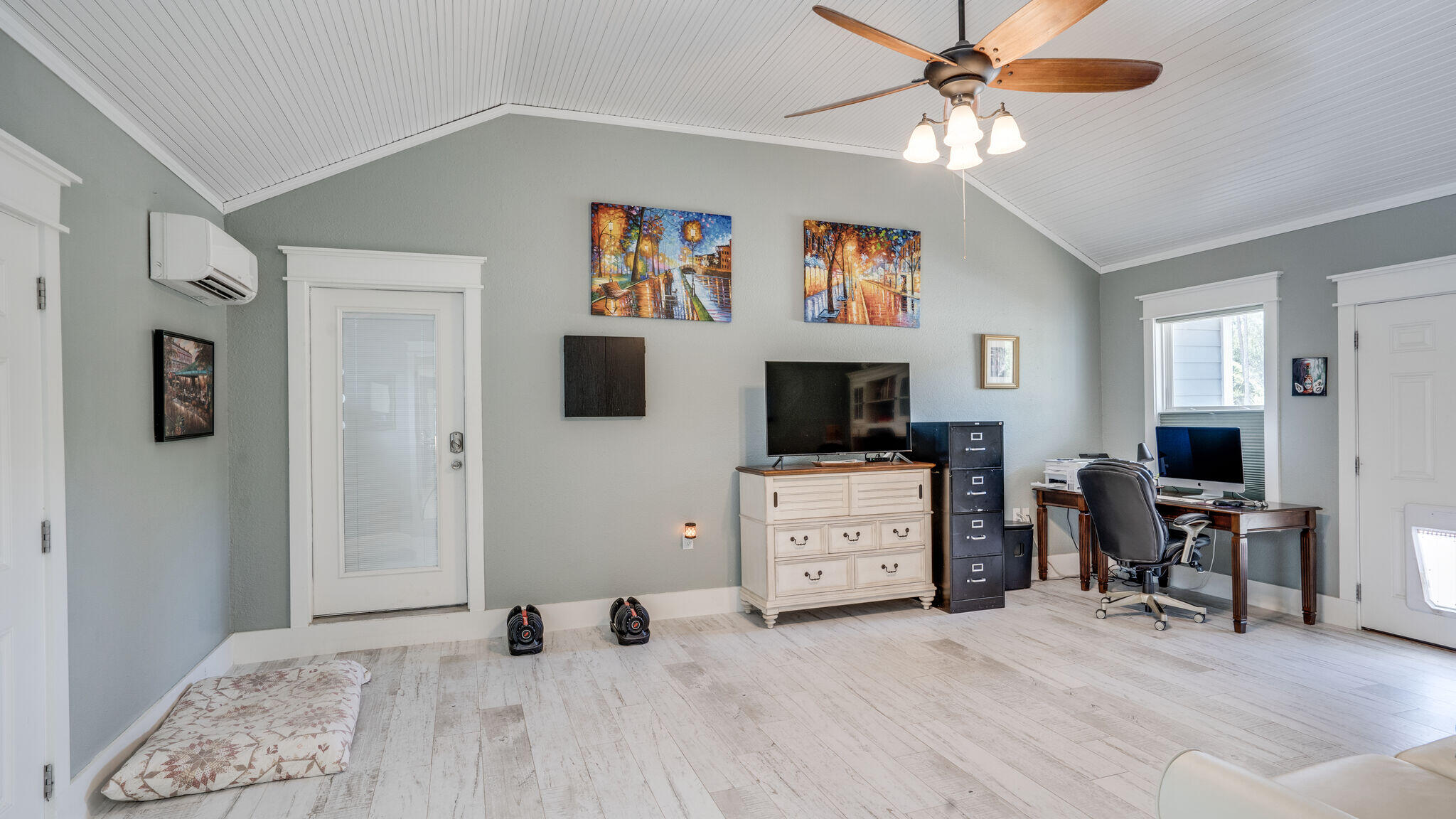786 Mack Bayou Road Santa Rosa Beach, FL 32459 - Photo 19 of 42 a bedroom with furniture and flat screen tv