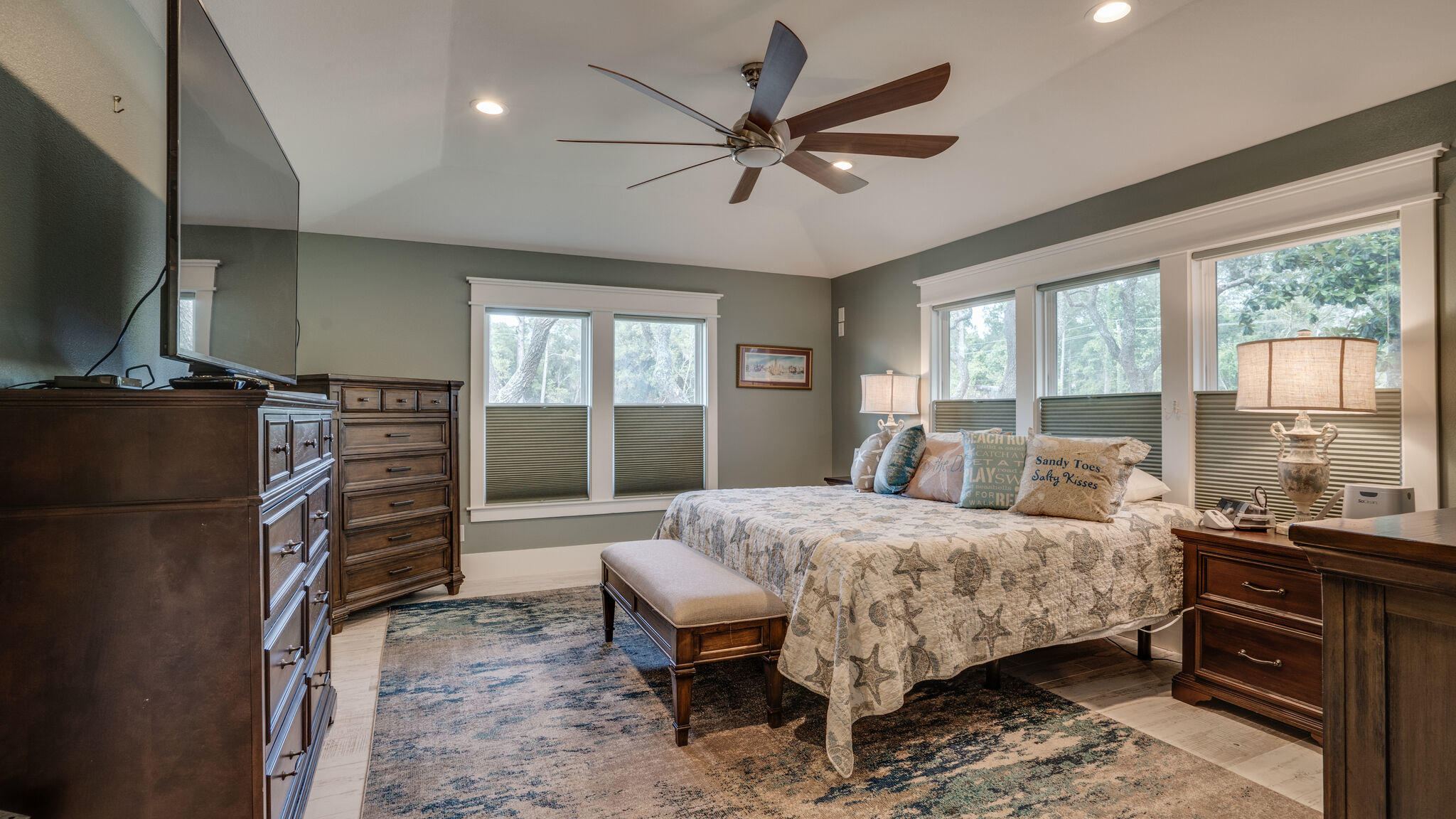 786 Mack Bayou Road Santa Rosa Beach, FL 32459 - Photo 20 of 42 a bedroom with a bed and a flat screen tv