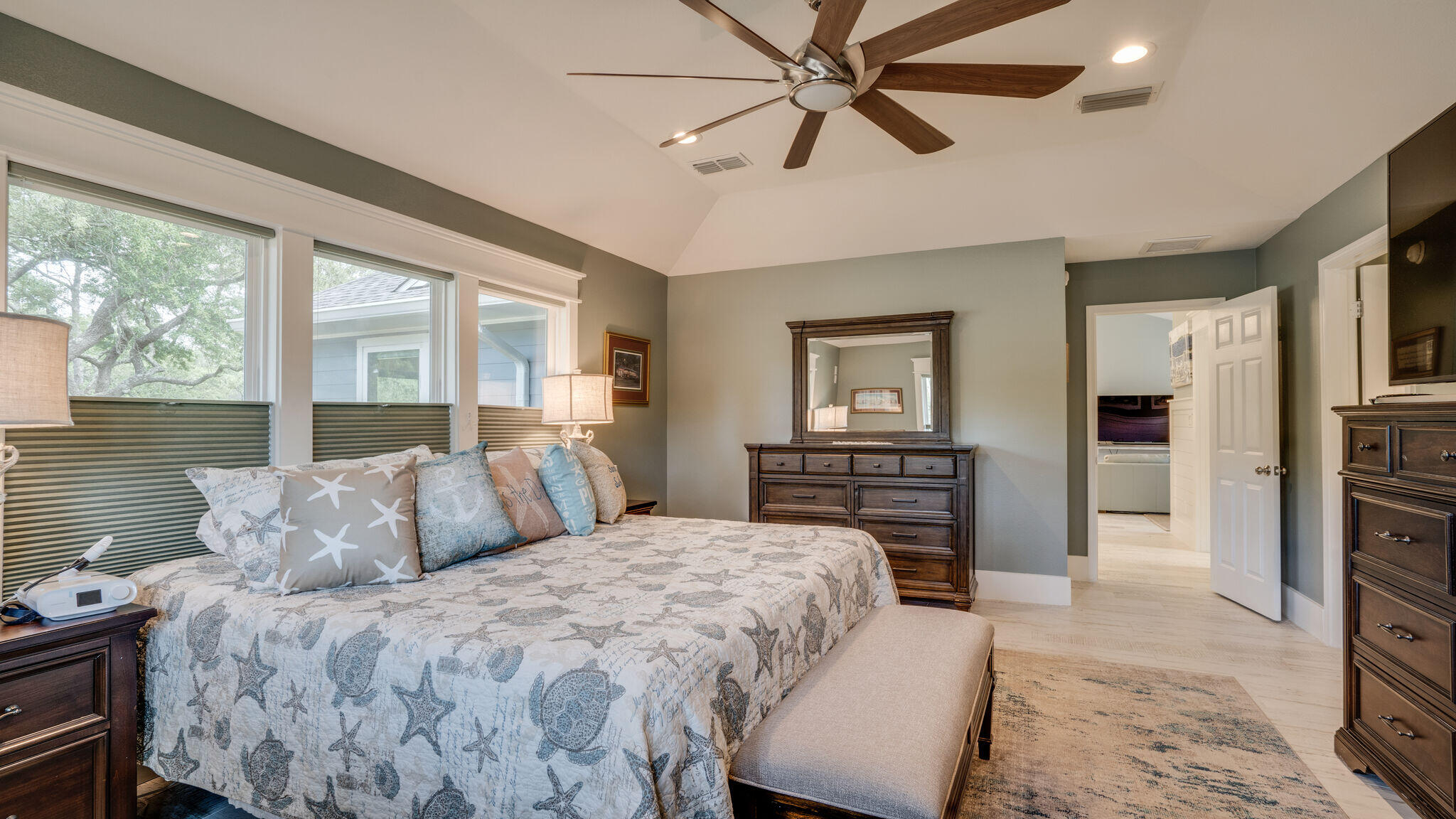 786 Mack Bayou Road Santa Rosa Beach, FL 32459 - Photo 21 of 42 a bedroom with a bed a dresser and a large window