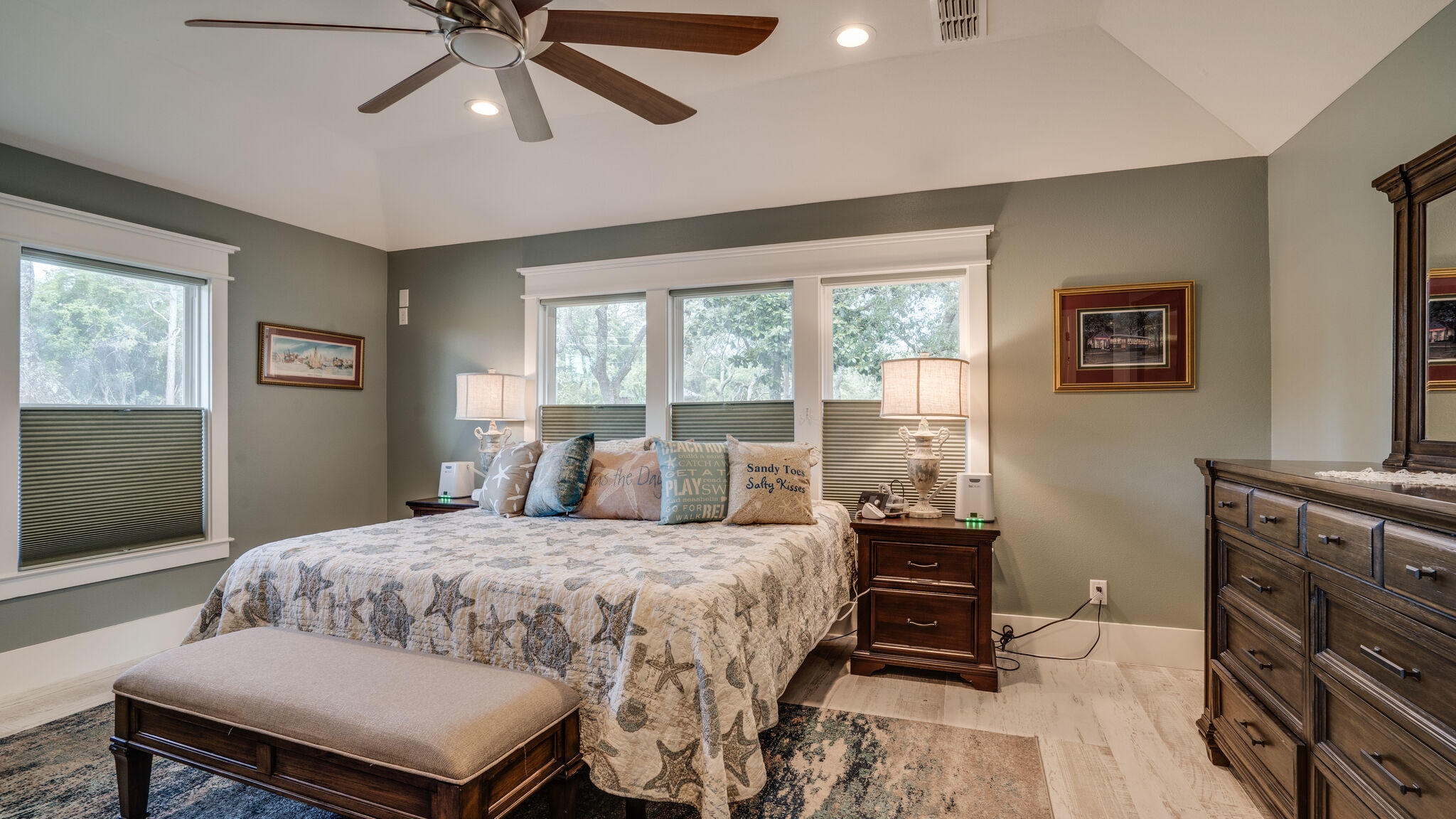 786 Mack Bayou Road Santa Rosa Beach, FL 32459 - Photo 22 of 42 a bedroom with a bed and a tv on the dresser