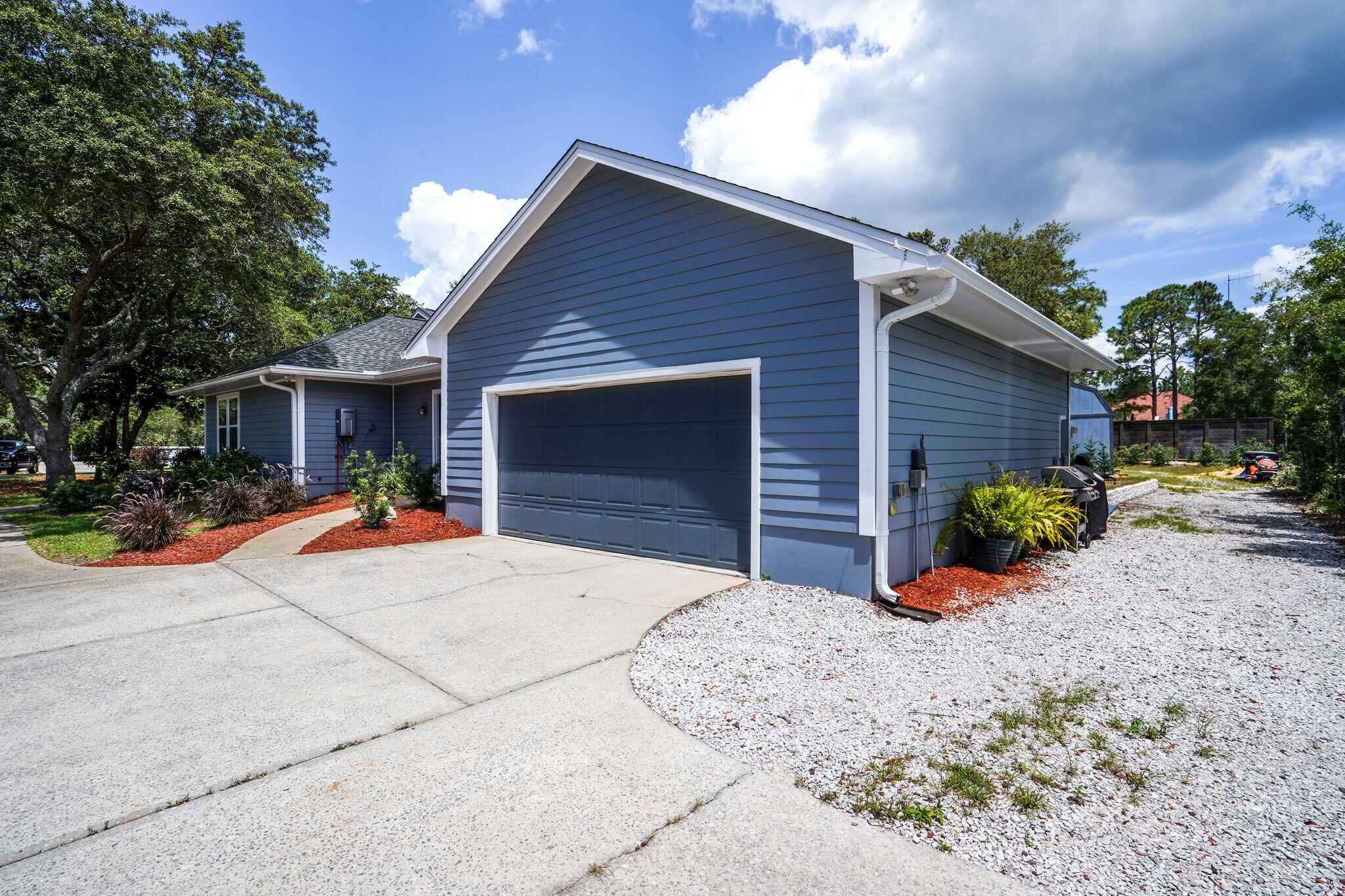 786 Mack Bayou Road Santa Rosa Beach, FL 32459 - Photo 34 of 42 a front view of a house with a patio