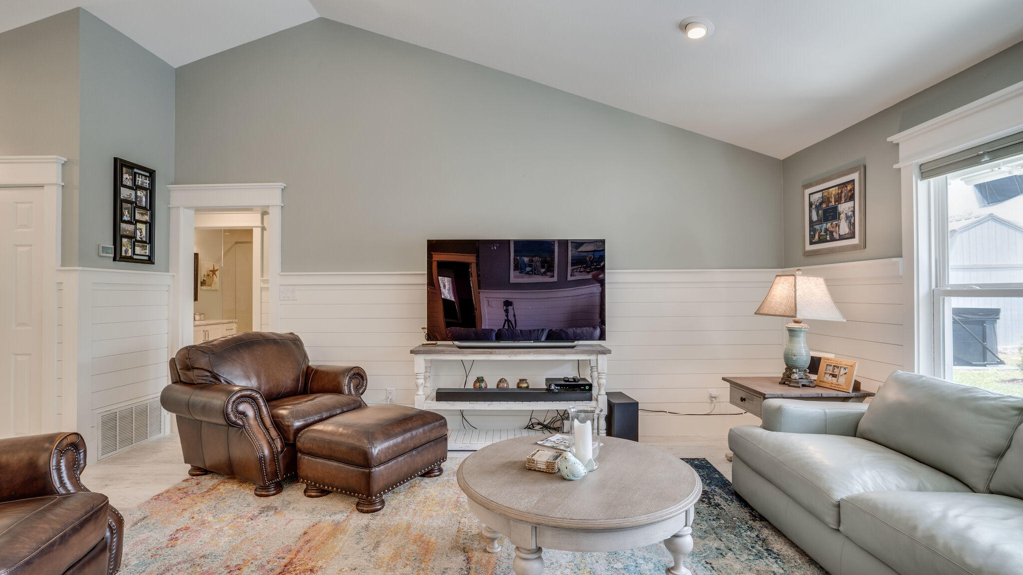 786 Mack Bayou Road Santa Rosa Beach, FL 32459 - Photo 4 of 42 a living room with furniture and a potted plant