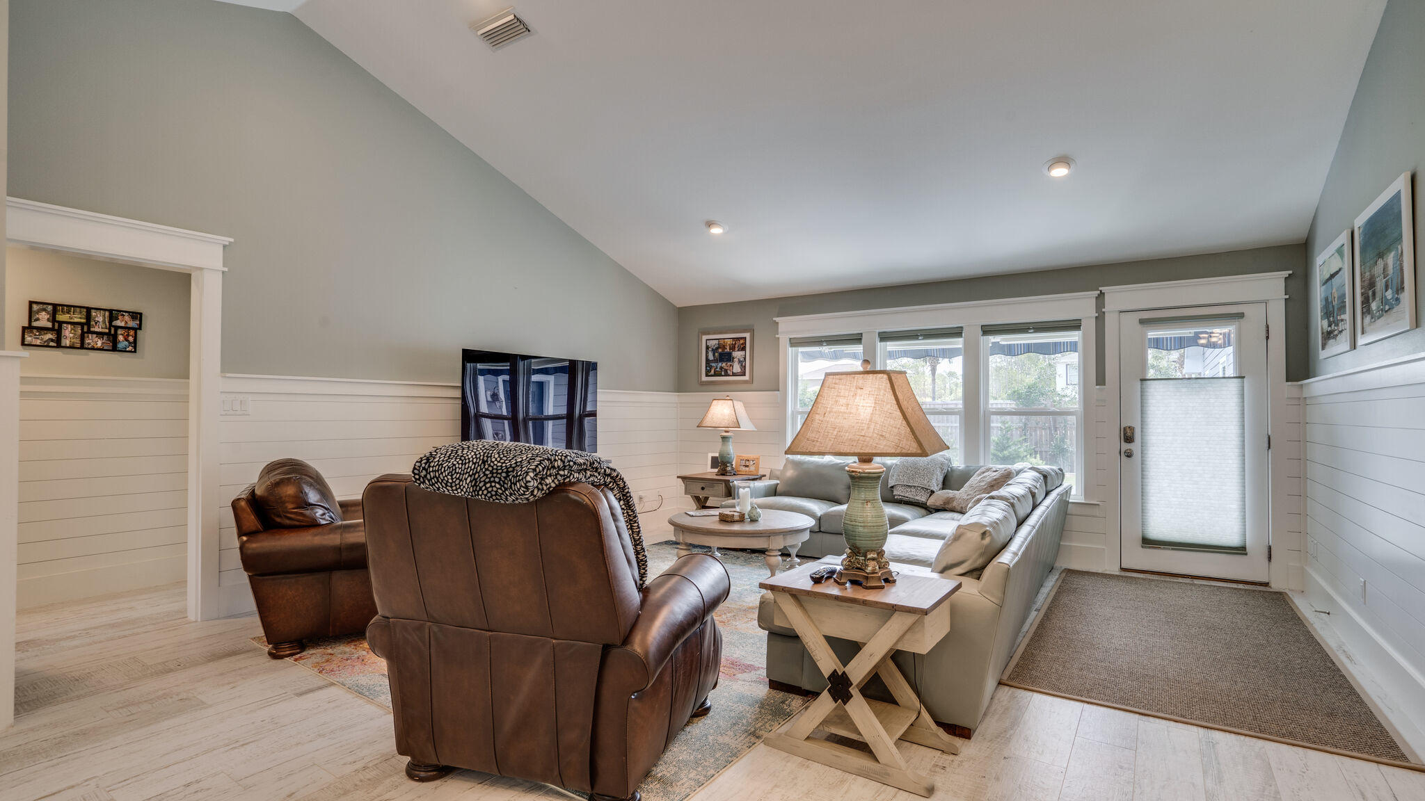 786 Mack Bayou Road Santa Rosa Beach, FL 32459 - Photo 5 of 42 a living room with furniture and a lamp