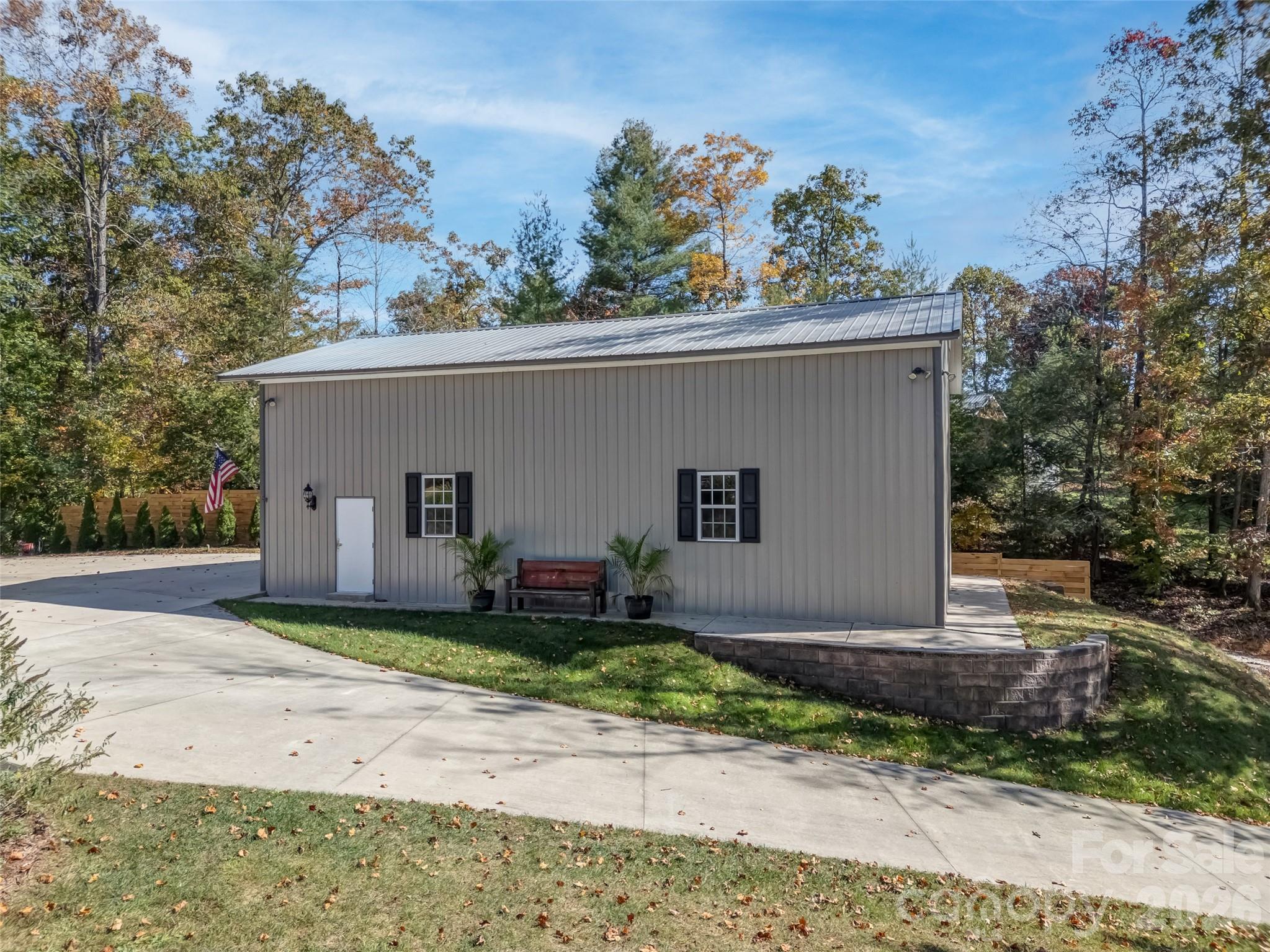 1340 Macedonia Road Saluda, NC 28773 - Photo 39 of 45 a house with trees in the background
