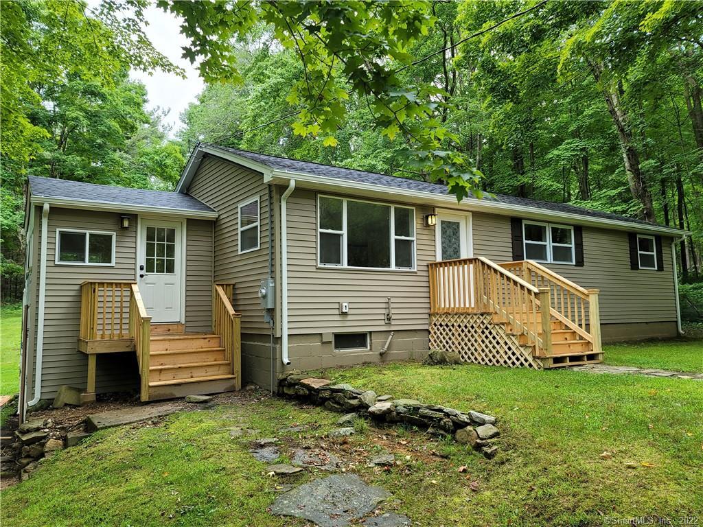 508 Merrow Road Tolland, CT 06084 - Photo 1 of 1 a view of a house with a yard