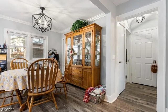 a kitchen with a window a sink and a refrigerator