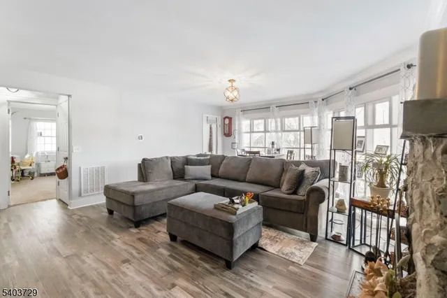 a stove top oven sitting inside of a kitchen