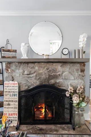 a bathroom with a toilet a sink and a window