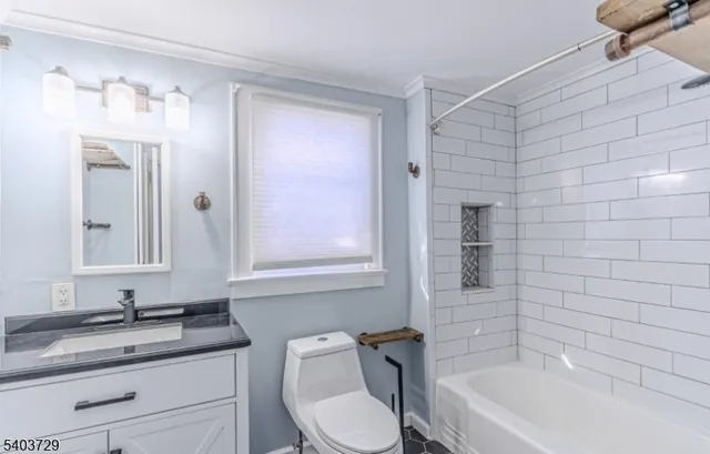 a view of a big room with wooden floor and windows in a room