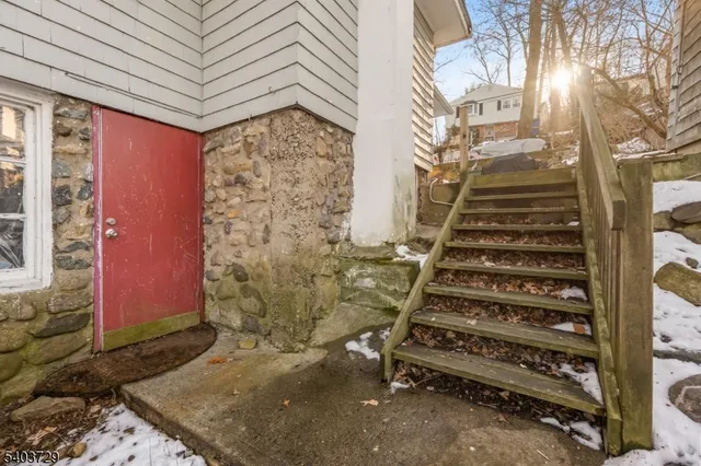 a view of a lake with houses in the back