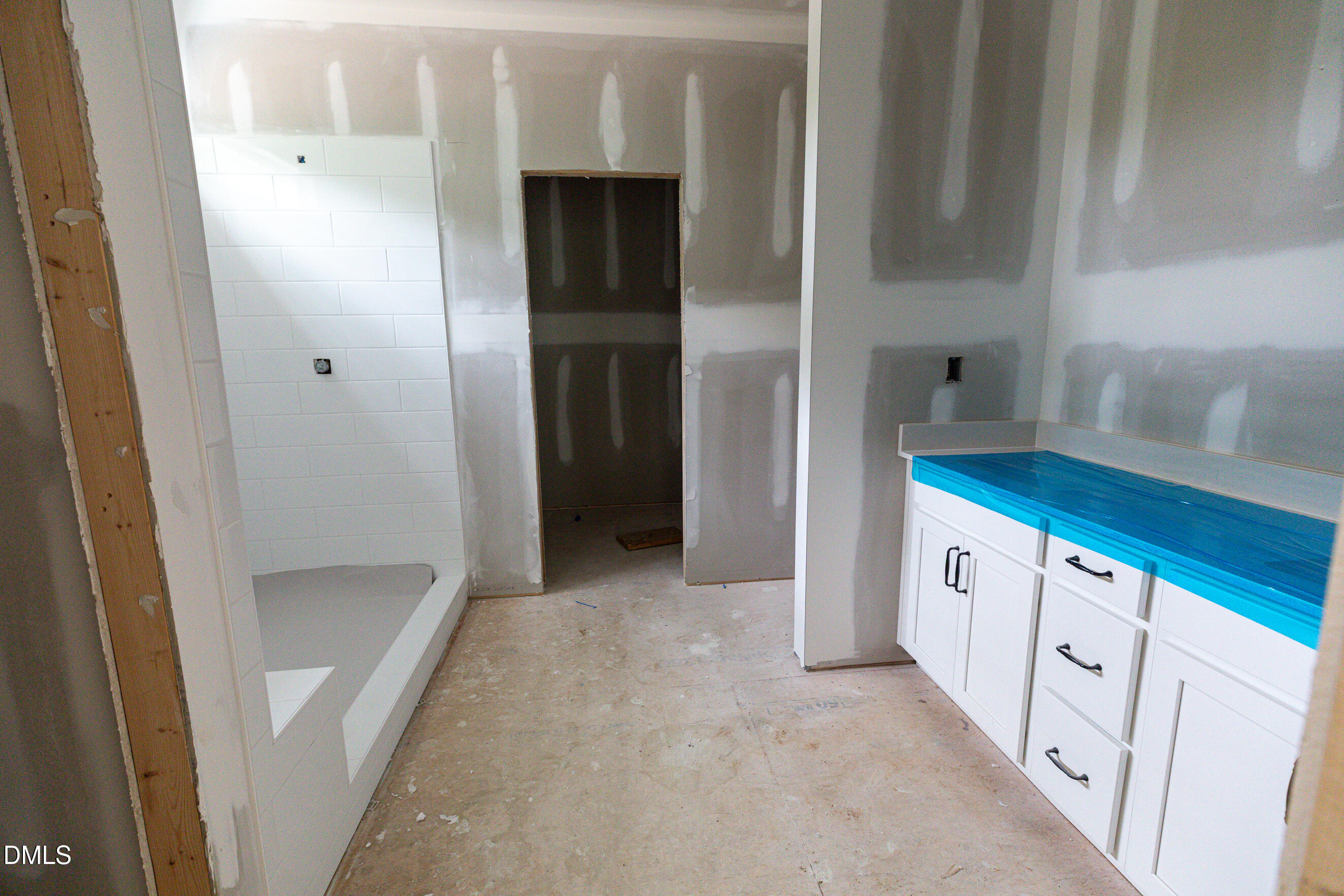 2000 Hayes Road Spring Hope, NC 27882 - Photo 9 of 19 a bathroom with a double vanity sink and a mirror
