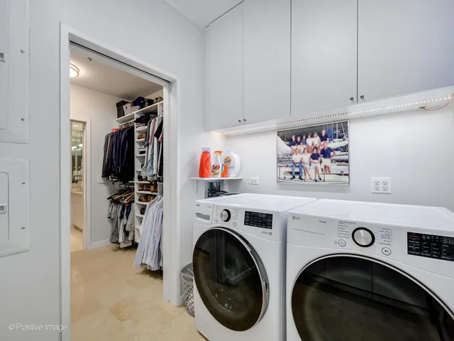 a view of hallway with washer and dryer