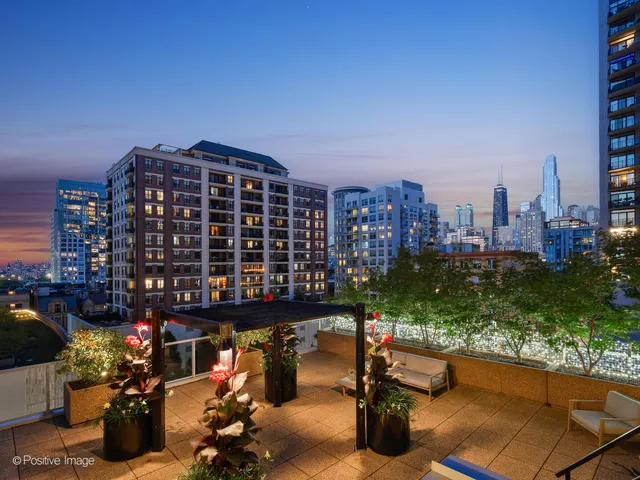 a view of a terrace with sitting area