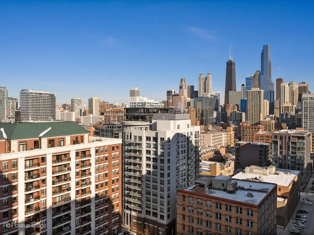 a view of a city with tall buildings