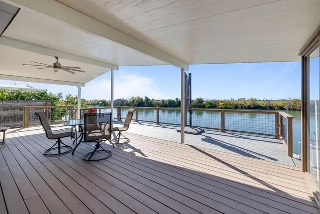 a view of sitting area with furniture and wooden floor