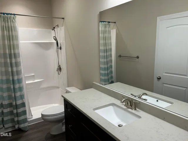 a view of outdoor space hardwood and a fire pit