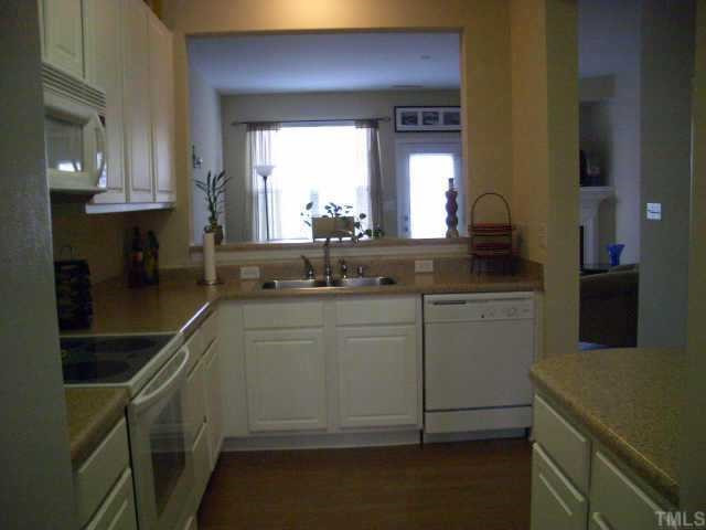 8424 Central Drive Raleigh, NC 27613 - Photo 4 of 9 Kitchen has tons of cabinet and counter space plus a pantry! Other