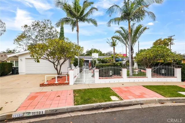 a front view of house with yard and outdoor seating