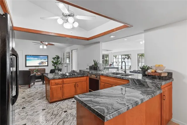 a kitchen with a table and chairs in it