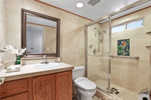 a bed room with a bed and a couch