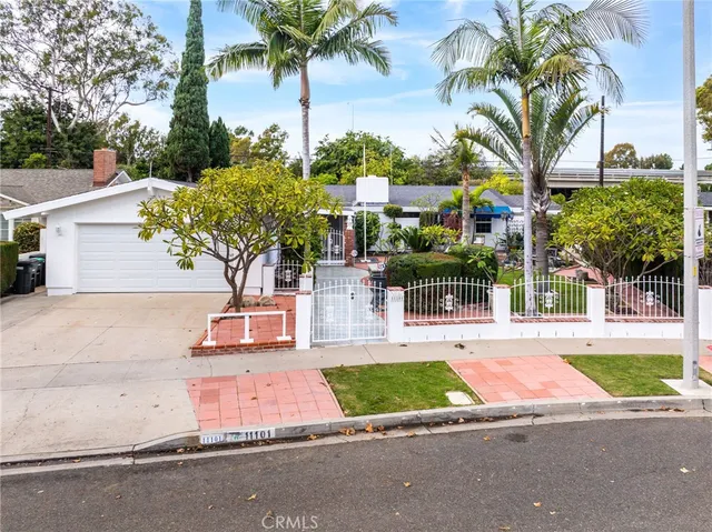 an aerial view of a house with outdoor space