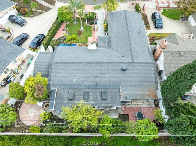 a view of a parking space with palm trees