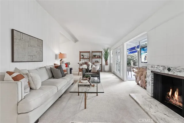 a living room with furniture and a couch