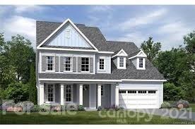 313 Helton Lane Fort Mill, SC 29708 - Photo 1 of 1 a view of a big house with a yard and plants