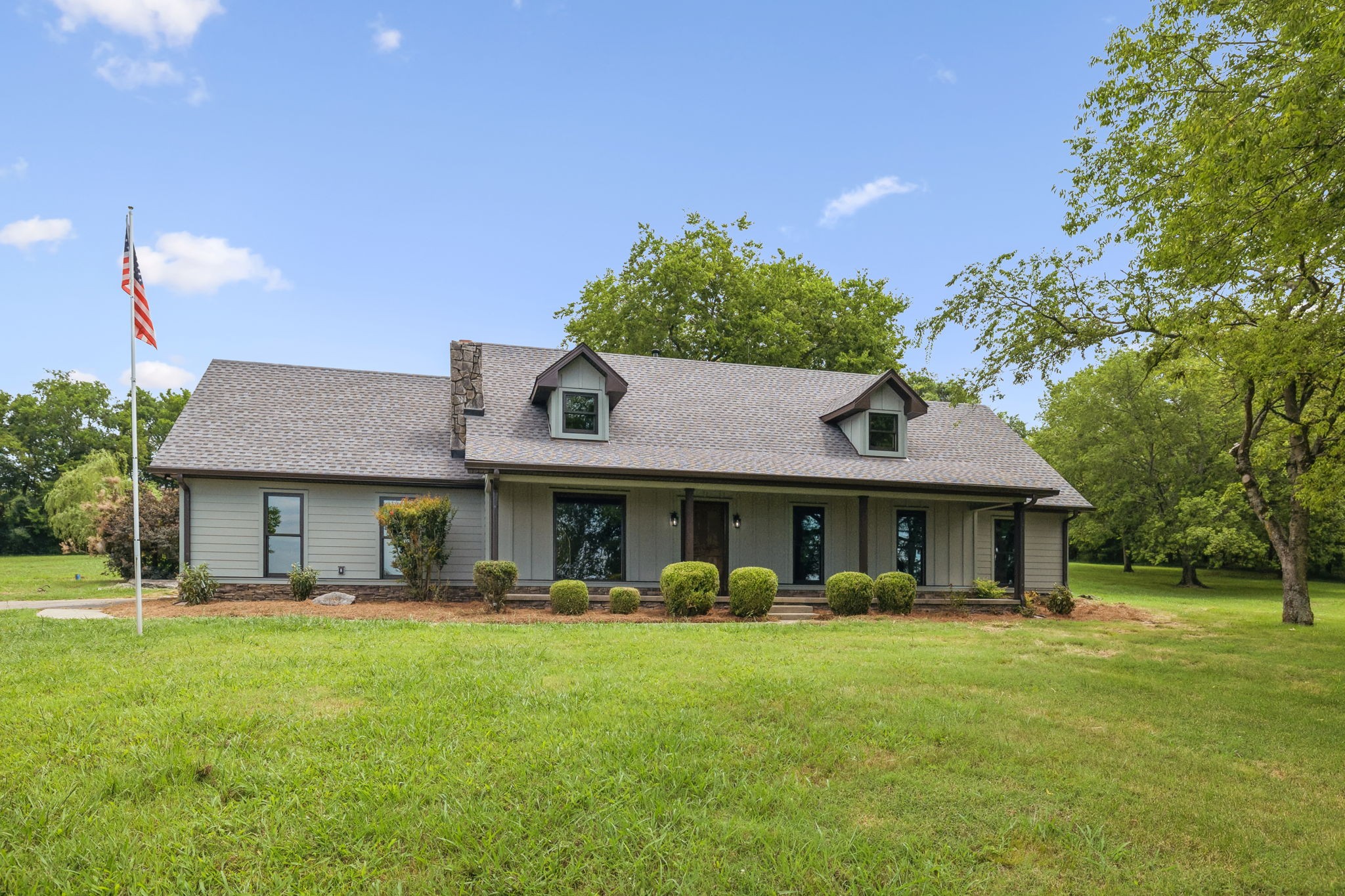 969 Trice Road Lebanon, TN 37087 - Photo 2 of 47 a front view of a house with a yard