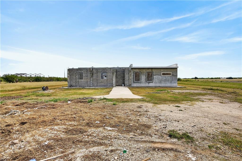 1424 North Sky Soldier Road Weslaco, TX 78596 - Photo 4 of 33 a view of a swimming pool with an ocean view