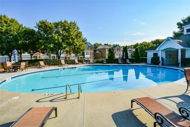 a view of a patio with swimming pool