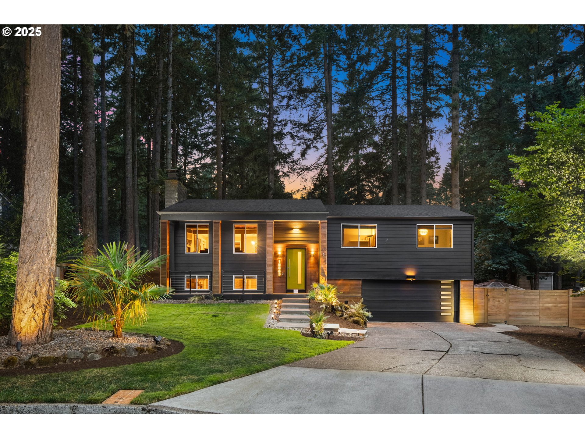18863 Southwest Indian Springs Road Lake Oswego, OR 97035 - Photo 1 of 33 a front view of a house with garden
